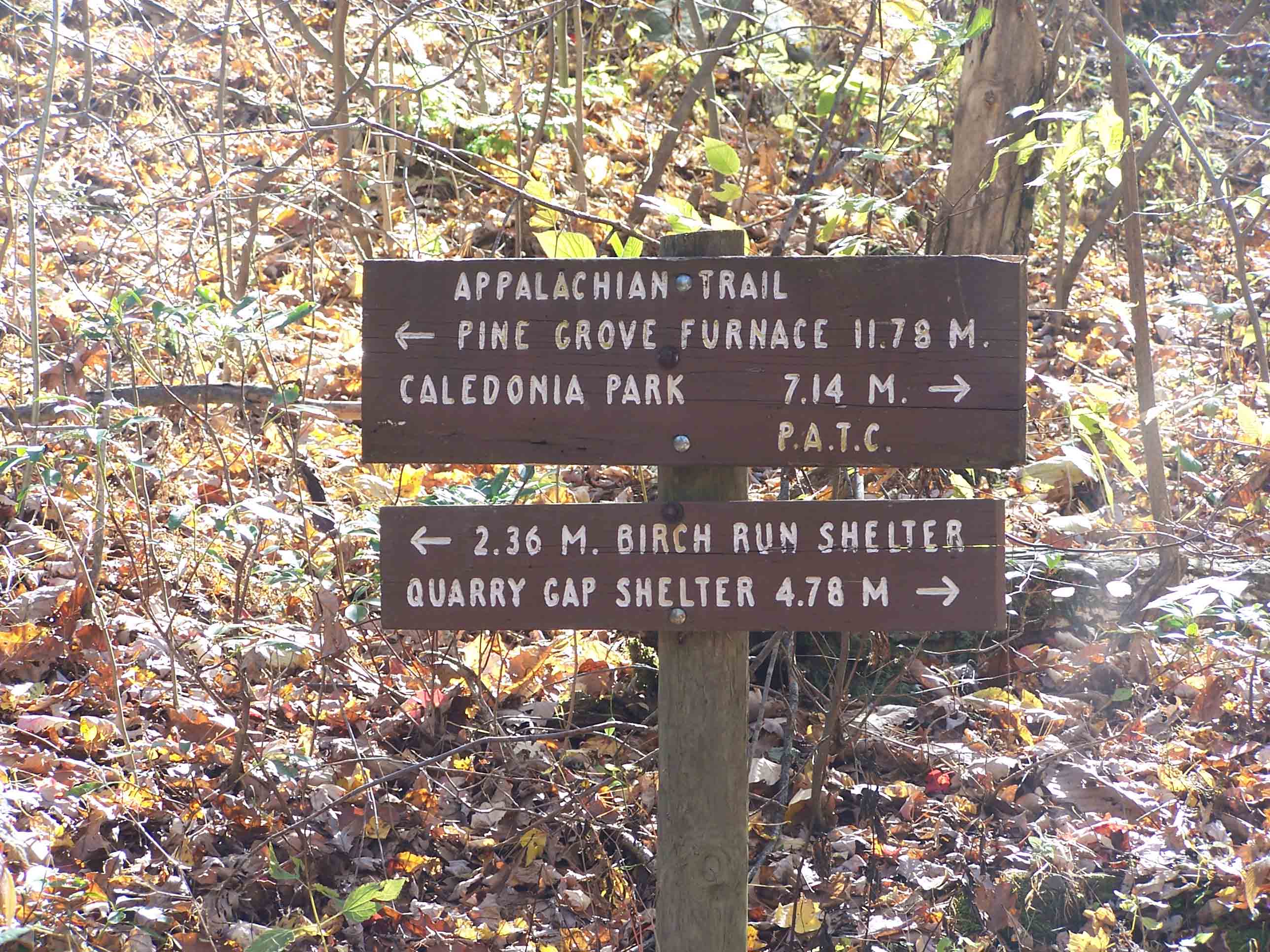 Sign at Milesburn Cabin mm 12.1. Courtesy at@rohland.org