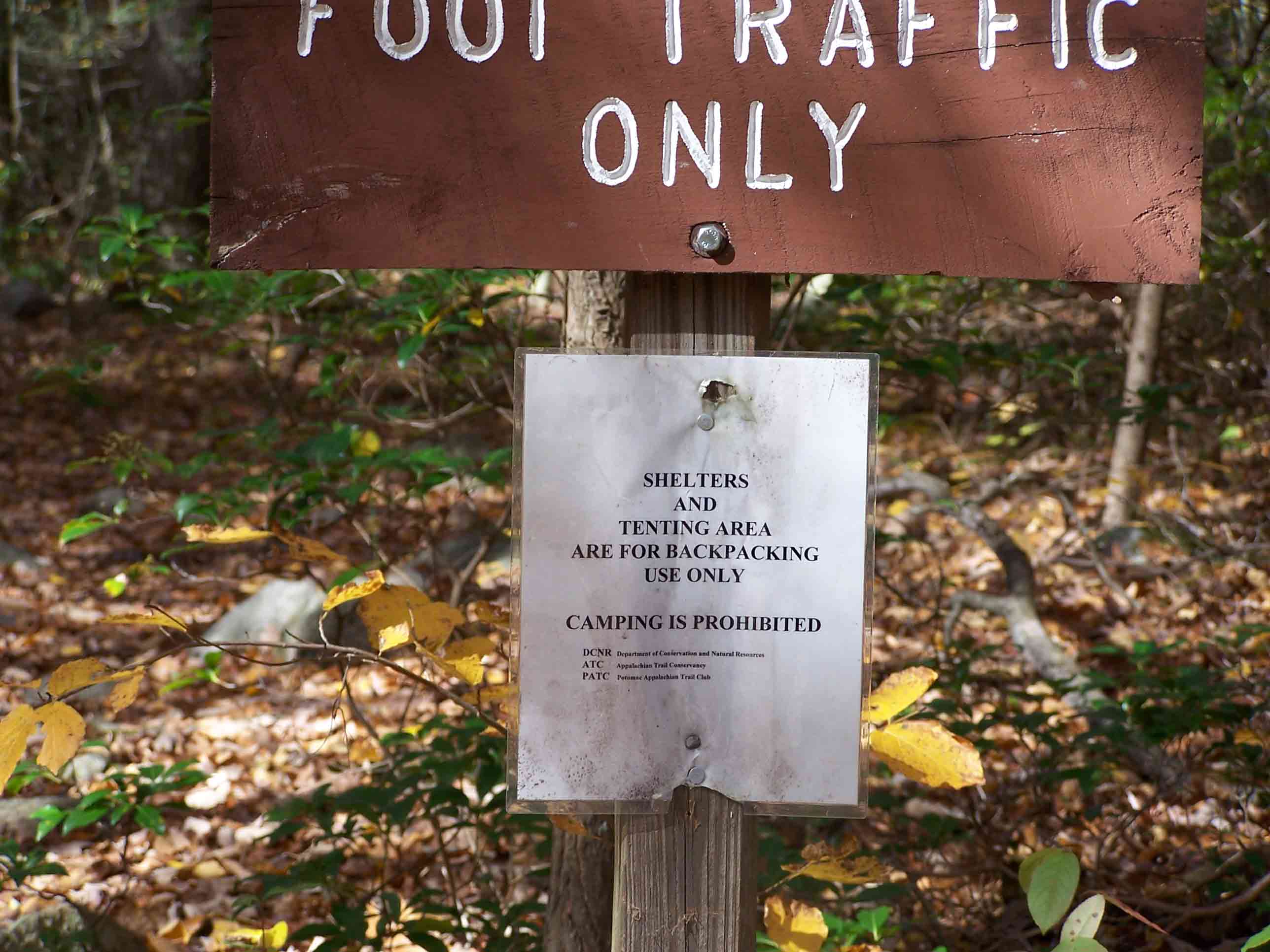 mm 10.7 Trail sign in Old Forge Picnic Grounds. Courtesy at@rohland.org