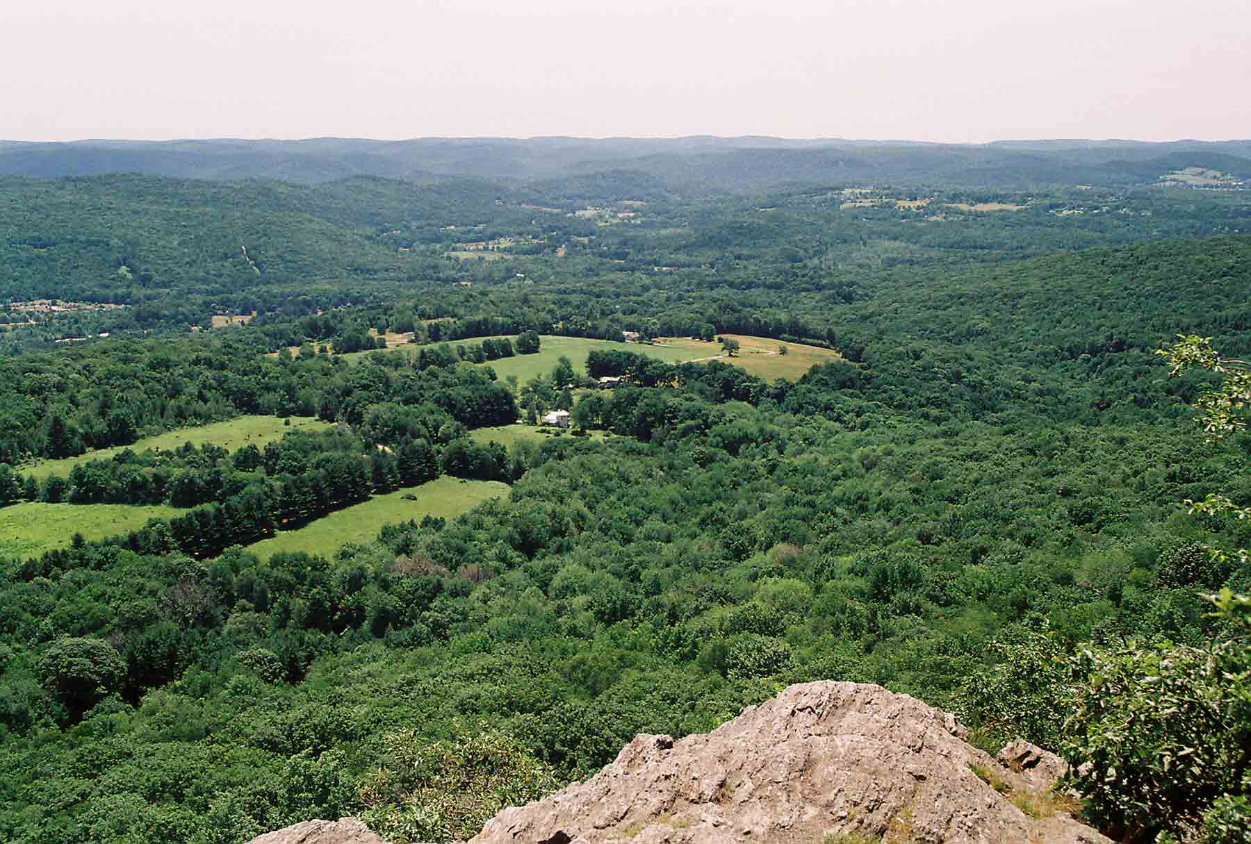 mm 4.7 - View to southeast from ledge on main Lions Head summit.  The southbound AT crosses the valley and ascends the nearest ridge on the far left of the pictue.  Courtesy dlcul@conncoll.edu