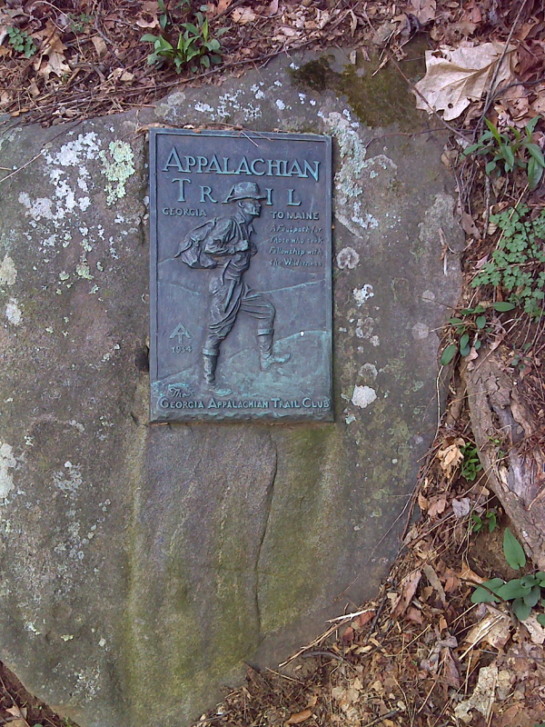 mm 0.0 George Noble plaque at Neels Gap.  The most famous of these is on Springer Mt.  There is also one at Unicoi Gap. This is the best preserved of the three.  GPS N34.7354 W83.9183  Courtesy pjwetzel@gmail.com