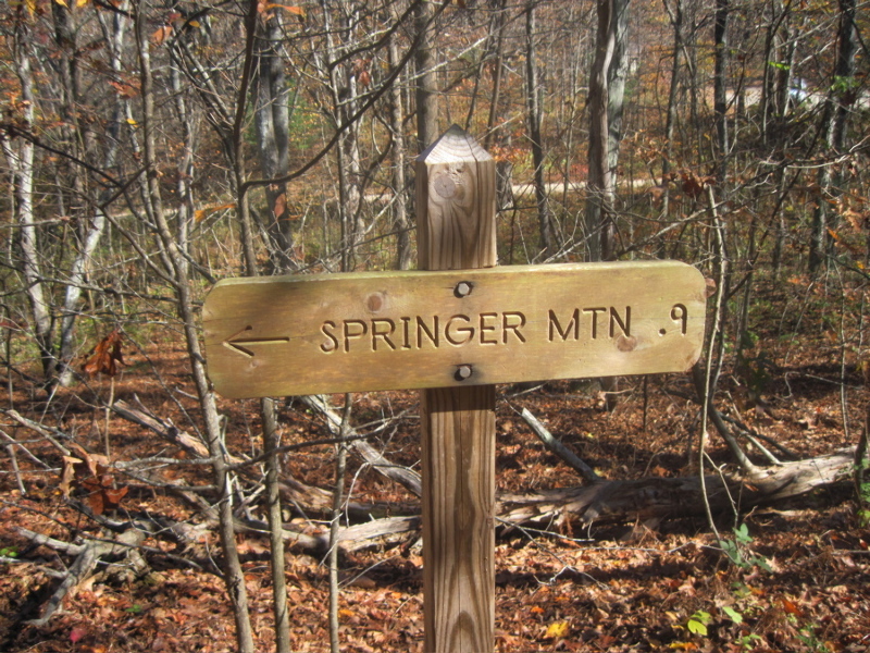 mm 7.6  Trail sign as the southbound trail leaves the Springer Mt. Parking area on USFS 42. Imagine if you were a southbound thru-hiker who has hiked 2180 miles and you saw this sign telling you had less than a mile to go to Springer, the southern terminus of the AT.    Courtesy dlcul@conncoll.edu