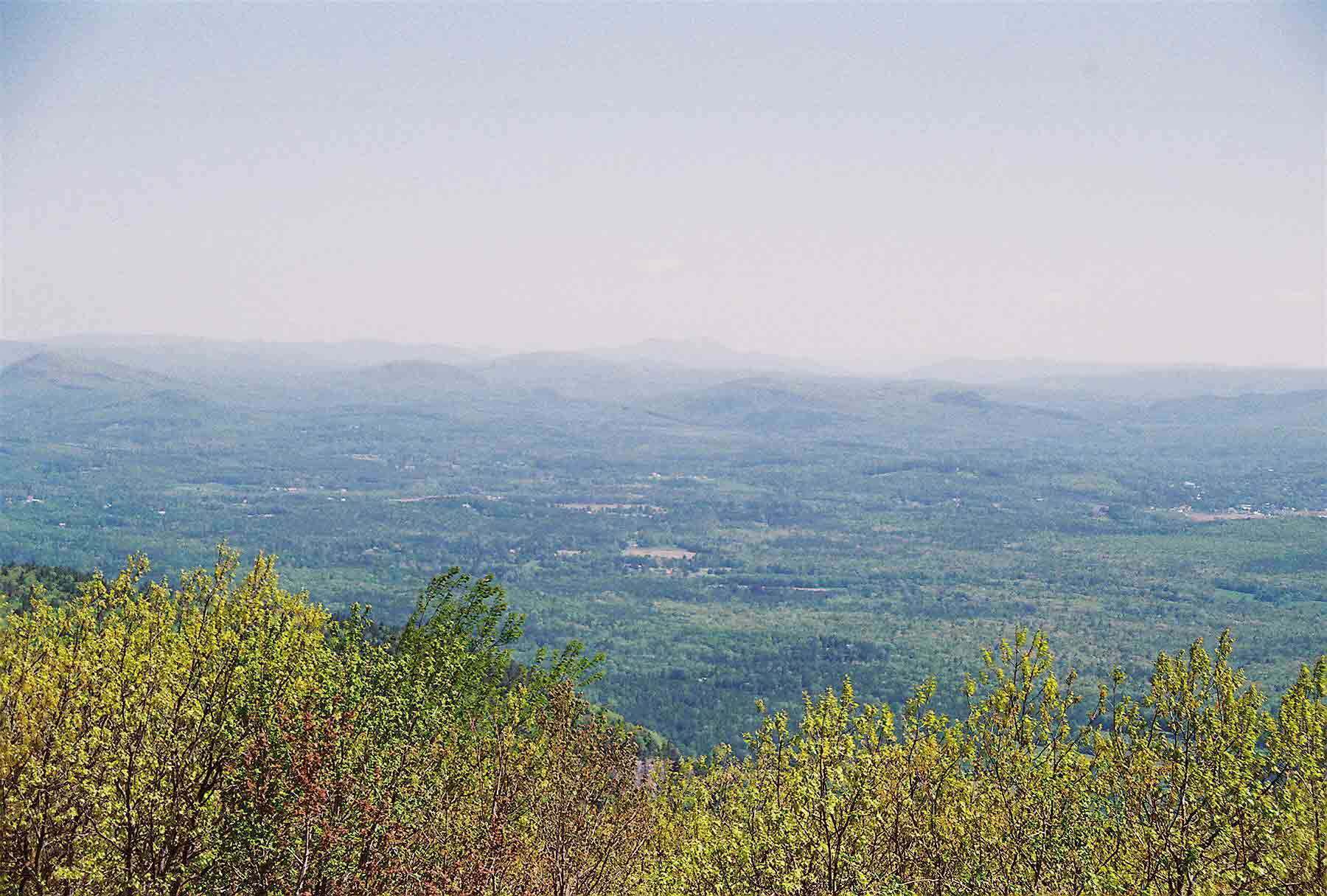 mm 4.6 - View to NE from summit of Mt. Everett. The mountain in the center of the picture  in the far distance is Mt. Greylock, highest point in MA. 74 trail miles and about 50 airline miles away.  Courtesy dlcul@conncoll.edu