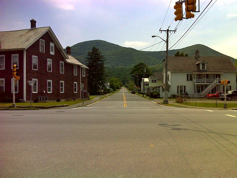 mm 0.0 intersection of MA 2 and Phelps Avenue in North Adams. No parking here.  The mountain on the left is Mt. Williams while that on the right is Mt. Prospect.  The southbound trail starts out by following Phelps Avenue.  It eventually goes over both mountains on the way to the summit of Mt. Greylock. GPS N42.7001 W73.1558  Courtesy pjwetzel@gmail.com