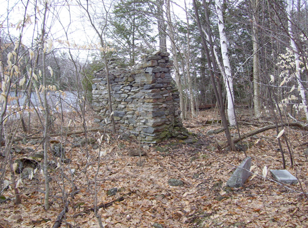 MM 1.9. Old chimney that was part of the Mohhekennuck Fishing and Hunting Club on Upper Goose Pond.  Courtesy dlcul@conncoll.edu