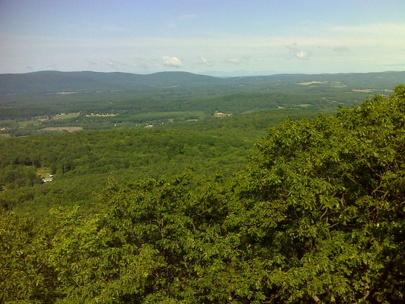 View to the west from the ledges on East Mountain.  The Catskills can be seen in the far distance. GPS N42.1548 W73.3311  Courtesy pjwetzel@gmail.com