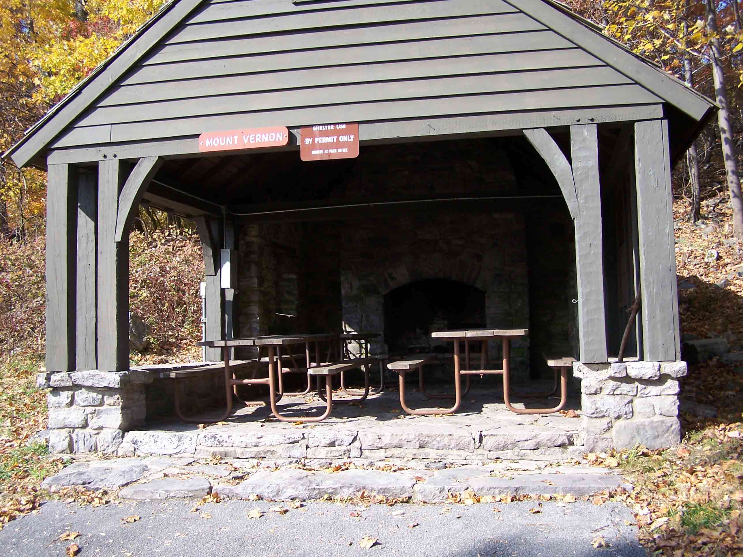 Mount Vernon pavilion with fireplace and picnic tables. Reservation only. Courtesy at@rohland.org