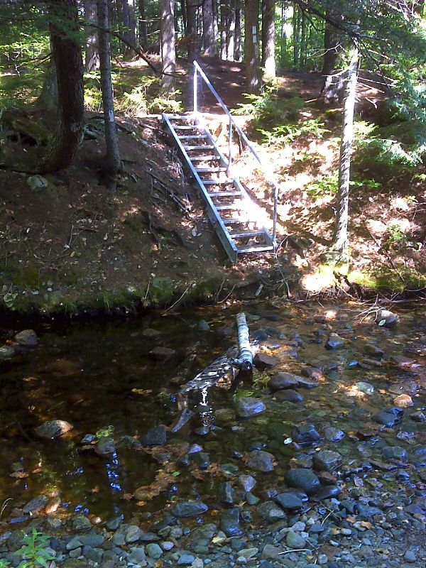 mm 3.7 Incongruous  aluminum staircase at ford of Tumbledown Dick Stream.    GPS N45.7340 W 69.0474   Courtesy pjwetzel@gmail.com