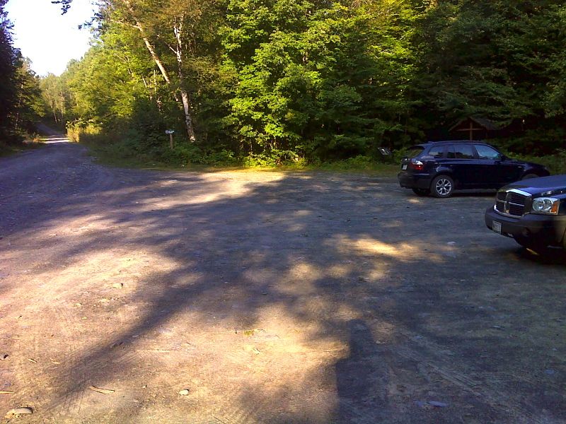 mm 0.0 Gulf Hagas parking lot on Katahdin Iron Works Road. There is a ten dollar per person per day fee to enter this area by vehicle.  A 0.2 mile long blue-bazed access trail leads to the AT at the West Branch of the Pleasant River. GPS N45.4777 W 69.2849  Courtesy pjwetzel@gmail.com