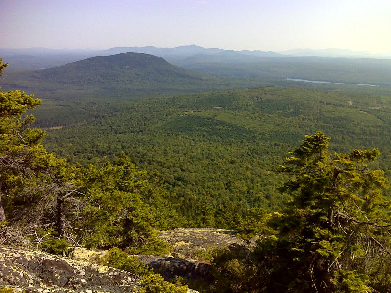 mm 29.7  View of  Hedgehog Hill and northern Moxie Pond from near summit of Pleasant Pond Mt.  GPS  N45.2717 W 69.8943  Courtesy pjwetzel@gmail.com