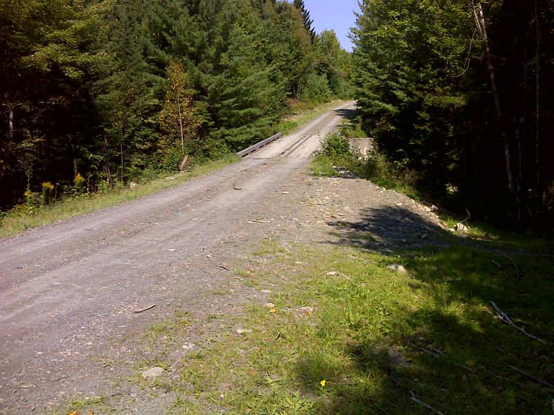 mm 13.9 Gravel logging road which provides  access from  Blanchard. Some roadside parking is available.  GPS 45.2763 W69.6899  Courtesy pjwetzel@gmail.com