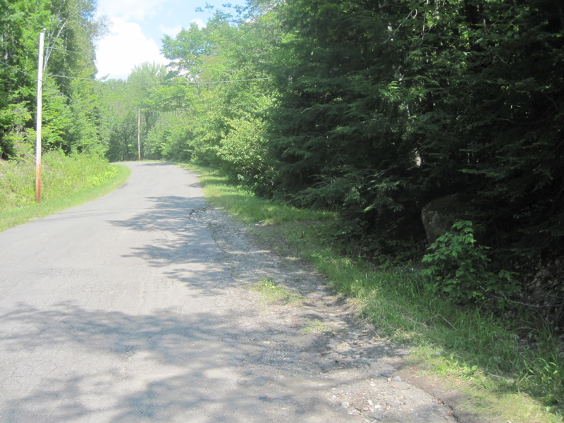 mm 6.3  Trail crossing of Shirley-Blanchard Road. Whatever parking there is here is roadside on the north side of the road (right in the picture). The northbound trail can be seen going off to the right.    Courtesy dlcul@conncoll.edu