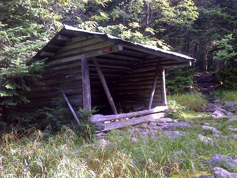 mm 31.6   Old Horns Bond Lean-to built in 1936.  It was still standing in August 2012. It is now day-use only. GPS N45.1442 W70.3303  Courtesy pjwetzel@gmail.com