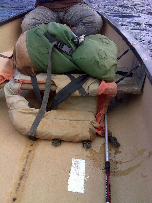 mm 0.0  White blaze on floor of canoe used to cross the Kennebec.  The canoe is the official route across the river.  Fording the river, an extremely dangerous undertaking, is not. GPS 45.2362 W70.0010.   Courtesy pjwetzel@gmail.com