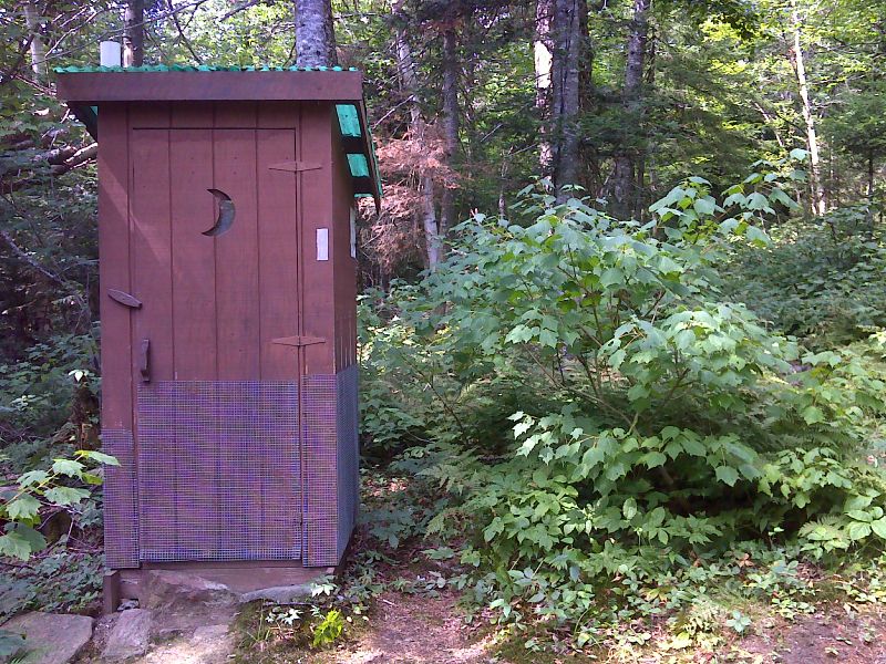 mm 37.0 Privy for Little Swift River Pond Campsite.  It is right on the AT.  Note white blaze. GPS N44.8501 W70.5921   Courtesy pjwetzel@gmail.com