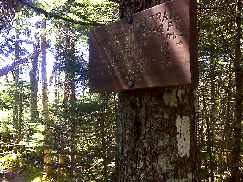 mm 6.3 Sign at wooded summit of west peak of Bemis Mt.  GPS N44.7949 W70.7684  Courtesy pjwetzel@gmail.com