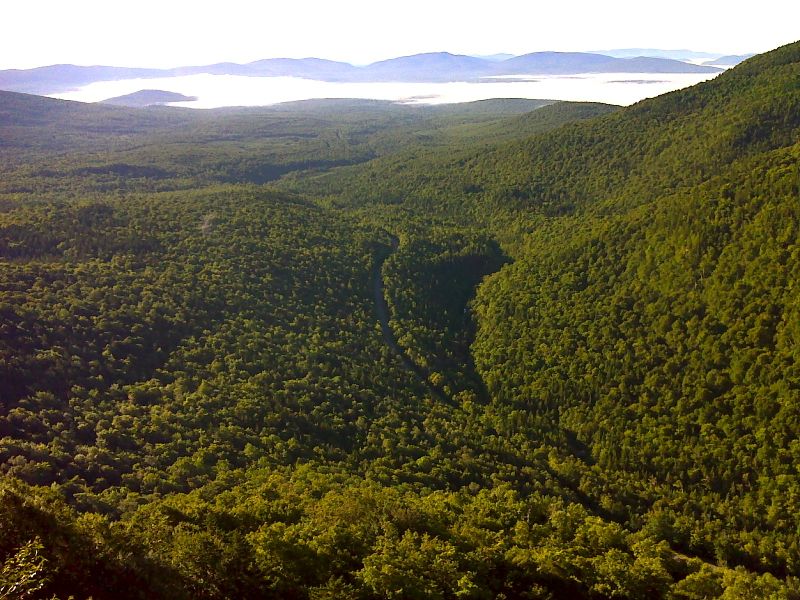 mm 12.7 Morning view to the southeast from overlook ledge above Black Brook Notch. GPS N44.7256 W70.7829  Courtesy pjwetzel@gmail.com