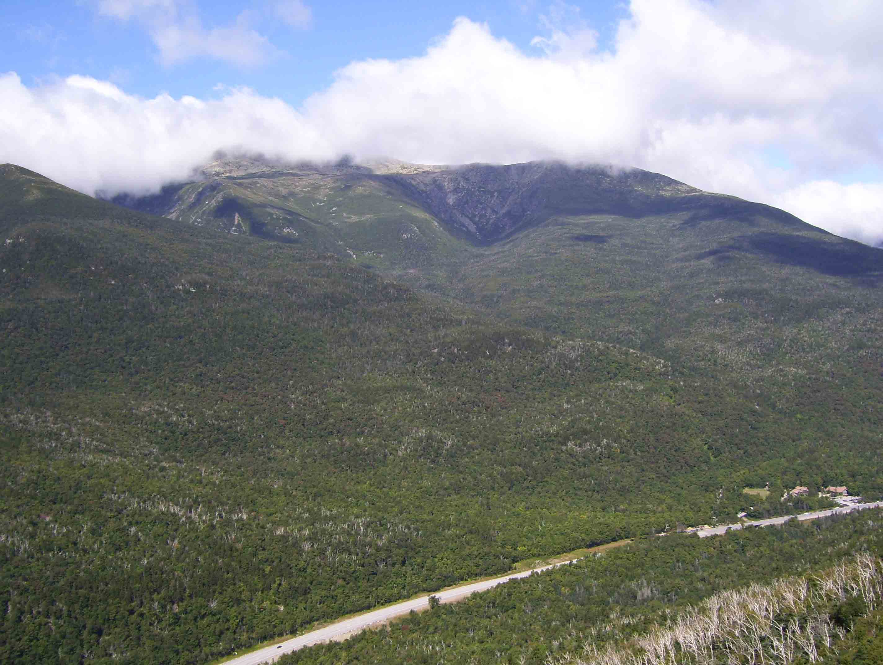 Pinkham Notch and Mt Washington (with summit in clouds) from the ledge at approximately mile 19.9.  Courtesy dlcul@conncoll.edu