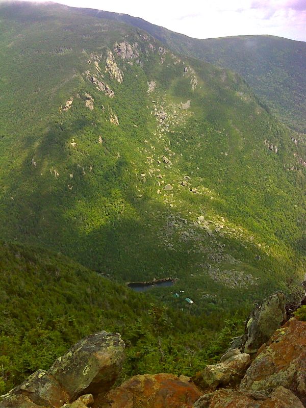 mm 16.1 Carter Notch from viewpoint near the summit of Wildcat A.  The hut and one of the Carter Lakes are visible. GPS 44.2592 W 71.2017  Courtesy pjwetzel@gmail.com