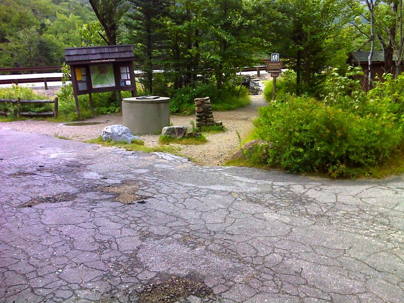 mm 20.2  Parking for Glen Ellis Falls on NH 16.  This is also the trailhead for the Wildcat Ridge Trail.  That trail, initially blue-blazed,  uses the pedestrian underpass seen in the picture to get to the east side of NH 16. It then crosses the Ellis River and meets the Lost Pond Trail 0.1 miles from the parking area.  From that junction  to Carter Notch, the Wildcat Ridge Trail is the AT.  GPS N44.2457 W71.2538  Courtesy pjwetzel@gmail.com