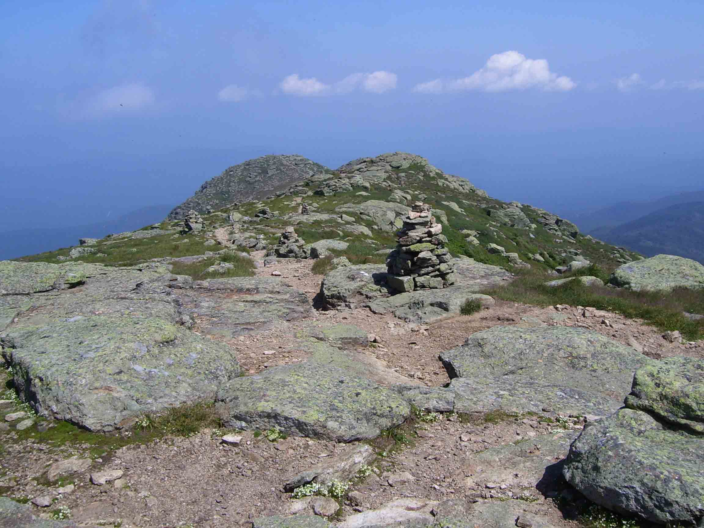View north along the ridge from the summit of Mt. Lafayette. The more distant of the two knobs in the center of the picture is North Lafayette.  Courtesy dlcul@conncoll.edu