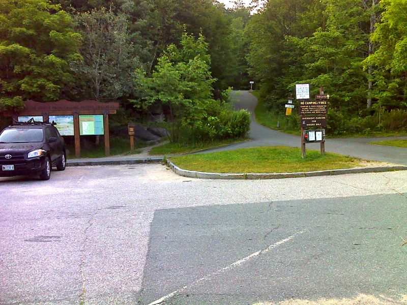 Trail head for Old Bridle Path and Falling Waters Trails . This is in the parking area on I-93 across from Lafayette Place Campground.  The Old Bridle Path leads to Greenleaf Hut.  From there the Greenleaf trail leads to the AT at Mile 21.3 (summit of Mt. Lafayette).  The Falling Waters trail joins the AT at mm 23.0 (summit of Little Haystack). GPS 44.1421 W71.6813  Courtesy pjwetzel@gmail.com