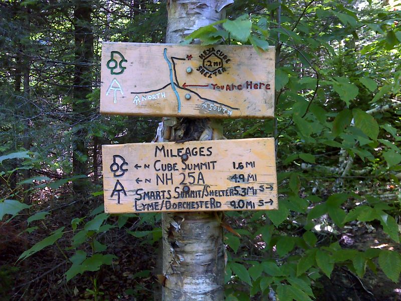 mm 4.9 Signs at junction with side trail to Hexacuba Shelter.   GPS N43.8750 W72.0283  Courtesy pjwetzel@gmail.com
