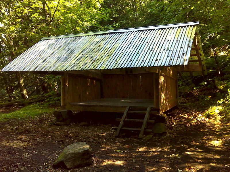 Velvet Rocks Shelter which has a transparent roof.  It is reached by a blue-blazed loop trail which connects with the AT mm 15.6 and 16.1.  It is about 0.2 miles to the shelter in either direction. GPS N43.7024 W72.2647  Courtesy pjwetzel@gmail.com