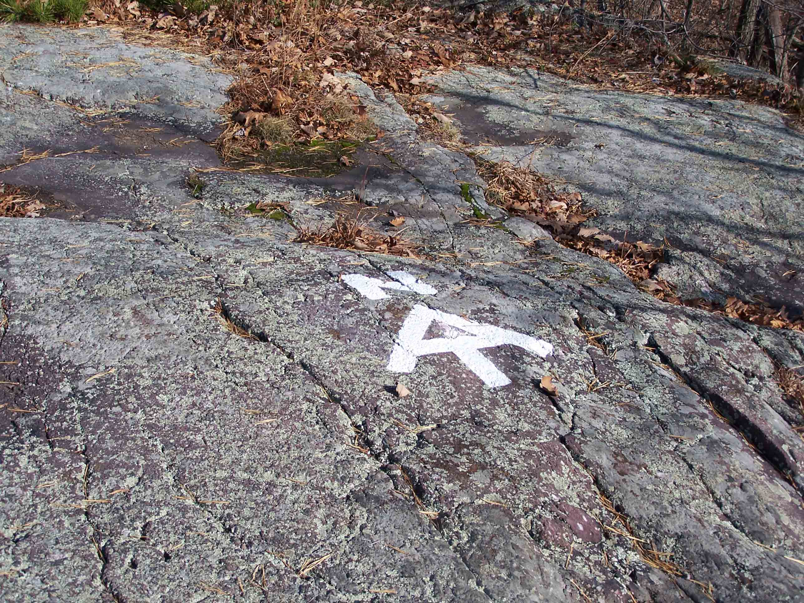 mm 0.0 - Direction sign on rocks. Courtesy at@rohland.org