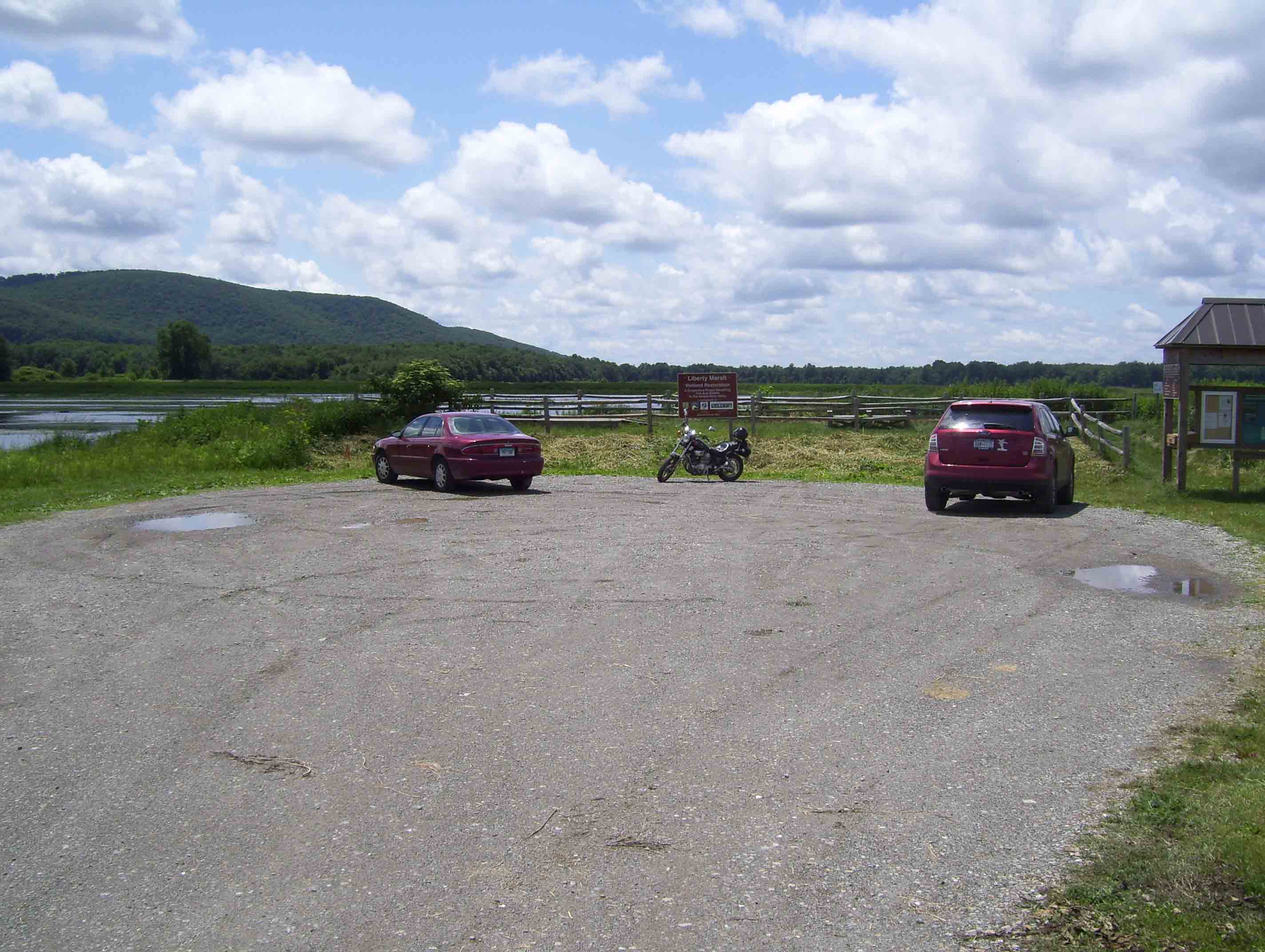 Parking area for Liberty Marsh, now part of the Walkill River National Wildlife Refuge. This is about 0.2 miles east of the point where the northbound AT leaves Oil City Road at mm 9.0.  Courtesy dlcul@conncoll.edu