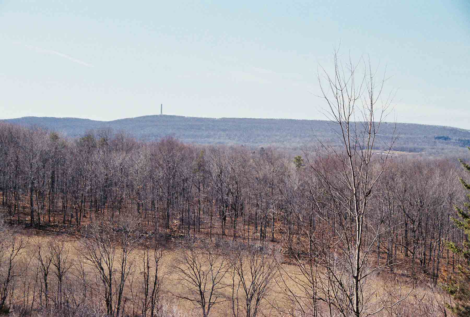 mm 2.9 - View west from Wolf Pit Hill to High Point. Note the monument at summit of High Point. Picture taken in March.  Courtesy dlcul@conncoll.edu
