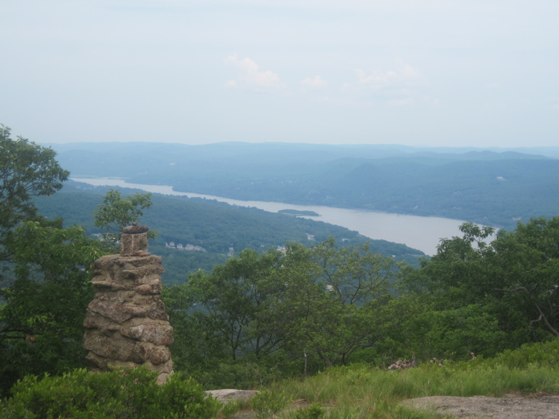 mm 3.2 View to the northeast from a viewpoint on a newly opened (2011) section of AT on the summit of Bear Mountain. The pillar once marked the boundary between Bear Mountain State Park and West Point.  Courtesy dlcul@conncoll.edu