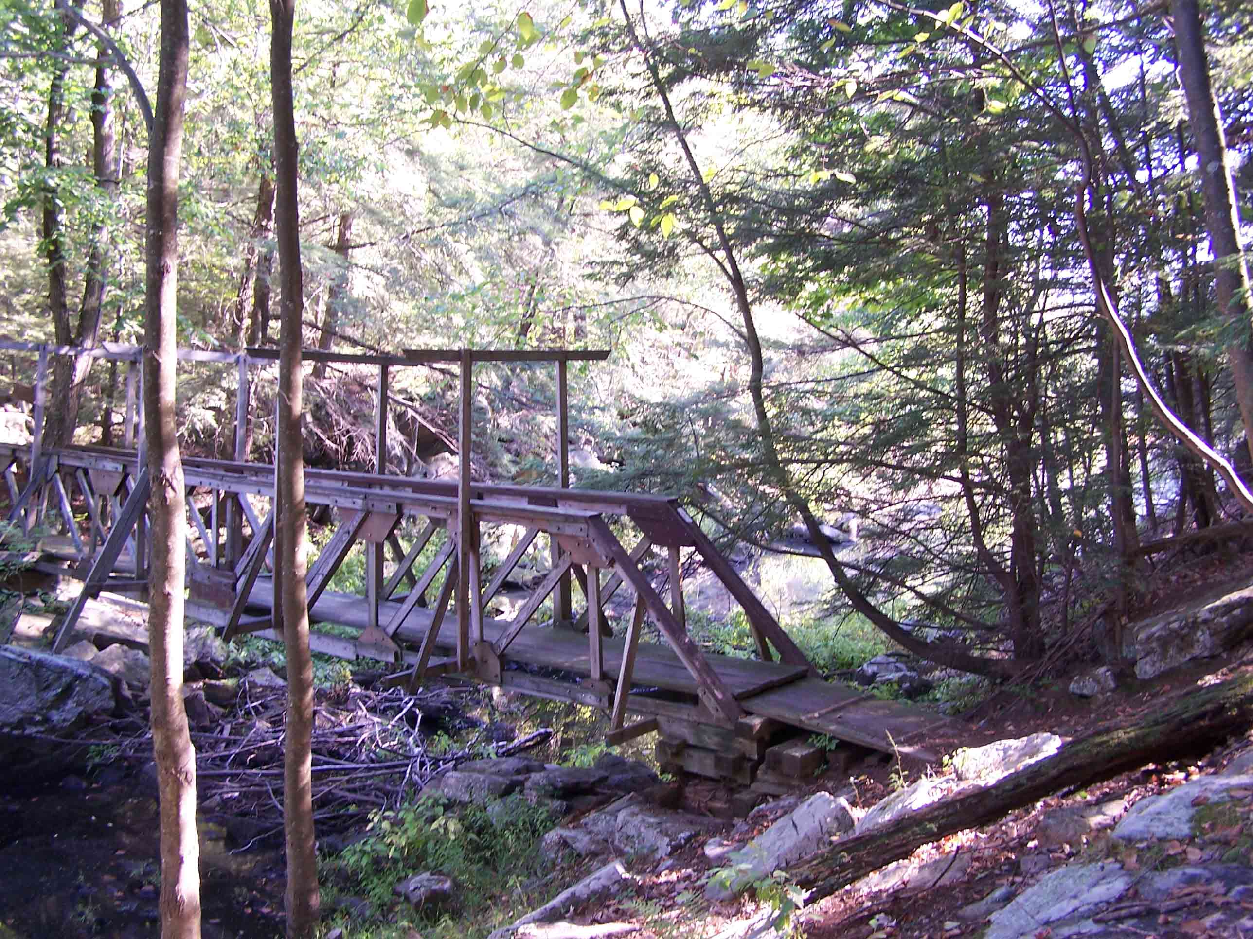 mm 2.9 - Wood-truss bridge over inlet of Little Dam Lake as it existed in 2008. Courtesy at@rohland.org