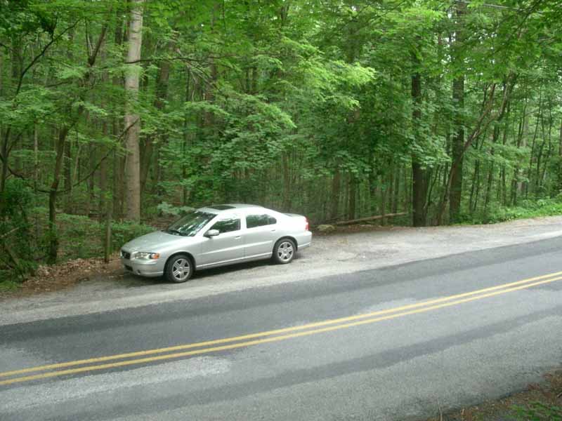 mm 6.0 Parking on the shoulder of the road at Whiskey Springs. The road at the trail crossing is narrow and with limited visibility. Parking here long term would be a definite safety hazard.  Courtesy MalteseCross@Comcast.net