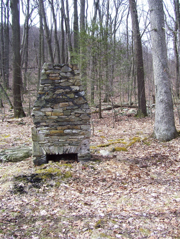mm 3.4 Old chimney at Toms Run Shelters.  There is supposedly a spring behind this.    Courtesy dlcul@conncoll.edu