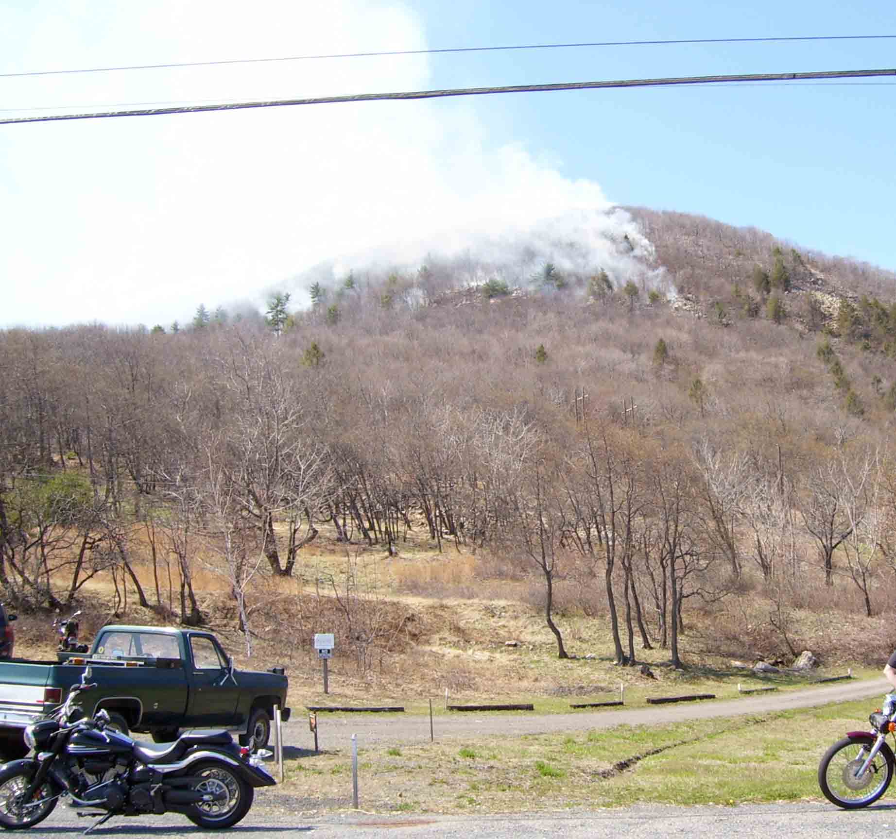 mm 0.0 - View from west side of Rte. 873 bridge of the forest fire on the west side of Lehigh Gap on 4/21/07. The AT parking area, filled that day with fire trucks and emergency vehicles, is just to the left.  Courtesy dlcul@conncoll.edu
