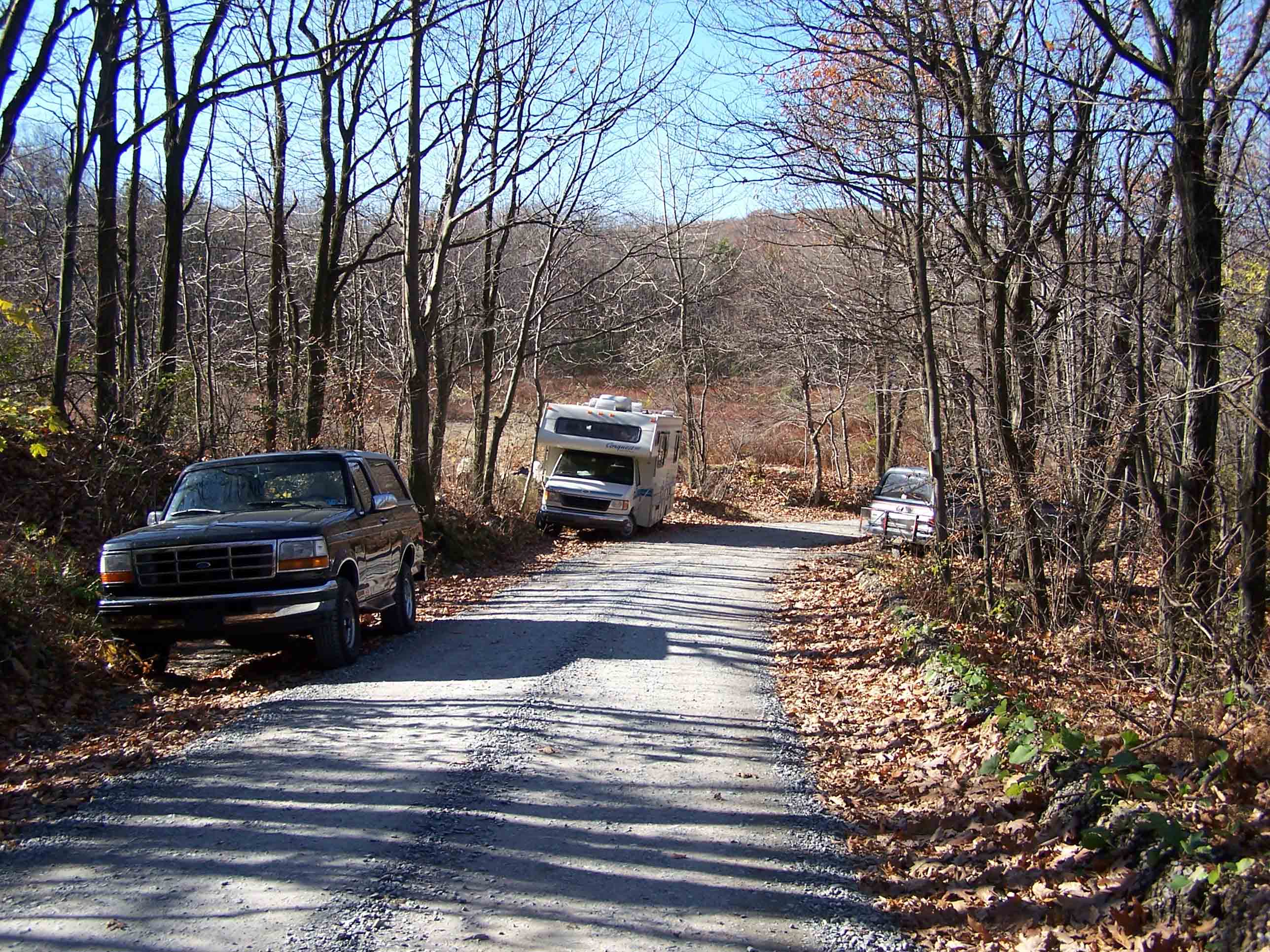 mm 5.0 - Parking on Blue Mountain/Ashfield Road. The AT used to follow Ashfield Road 0.2 miles. Southbound the trail went left just past where the RV is parked and started to follow a woods road. Due to a recent relocation, the trail now crosses the road directly and skips the road walk. However the area shown in the picture is still viable parking.