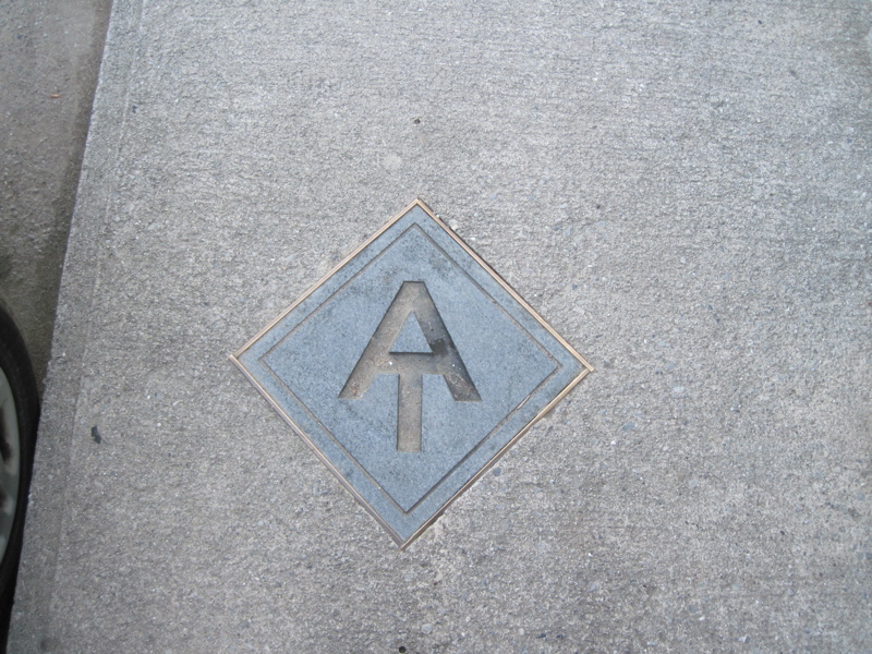 The AT is blazed through Hot Springs with these AT symbols in
the sidewalk.  Taken at approx. mm 14.6  Courtesy dlcul@conncoll.edu