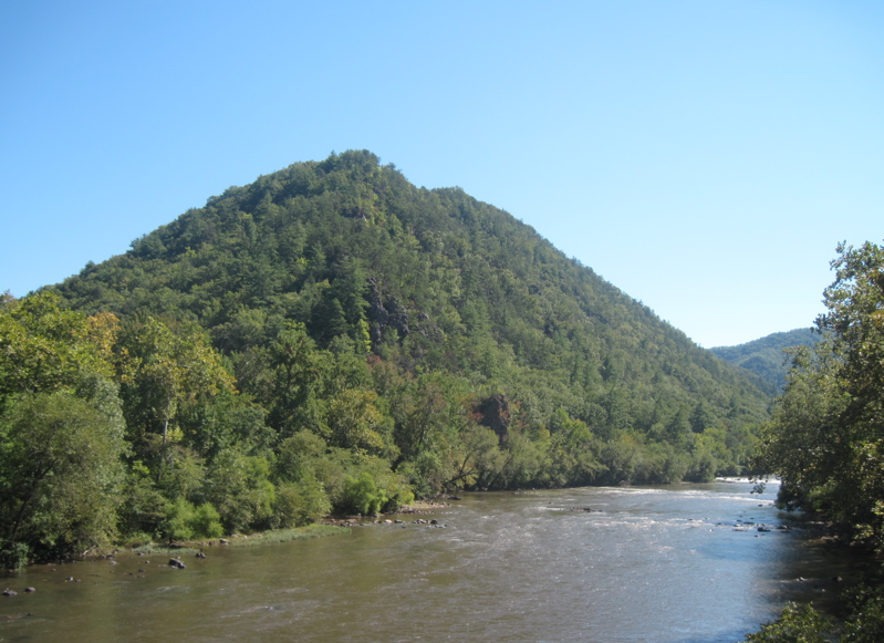 mm 14.4 Looking southeast (upstream) from the US 25/ 70 highway bridge over the French Broad River. The prominent mountain in the picture is Lovers Leap ridge which the trail traverses.  Courtesy dlcul@conncoll.edu