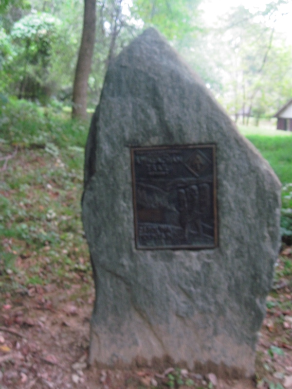 mm 0.4  Stone marker at the Serpentine Street trail head.    Courtesy dlcul@conncoll.edu