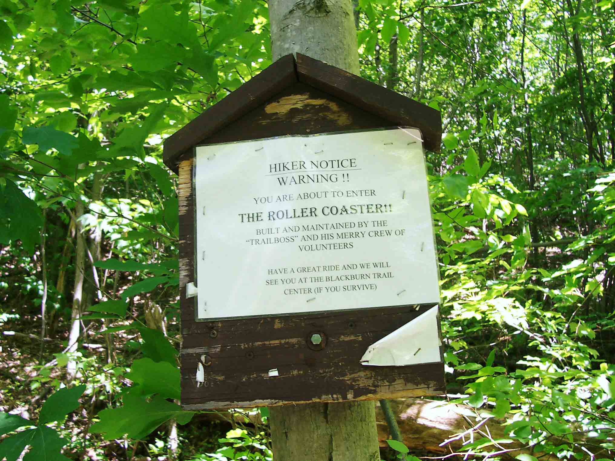 mm 10.1 - Sign at south end of 'The Rollercoaster'. Development has pushed the trail off the ridge in this area and the trail goes over 10 hills and side ridges in 13 miles, climbing and losing 300-700 feet on each one.  Courtesy dlcul@conncoll.edu