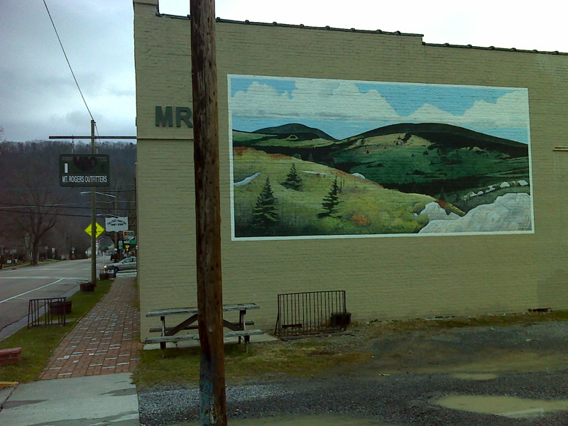 mm 16.9  Mural on the side of Mount Rogers Outfitters on Laurel Avenue in Damascus. Laurel Avenue is the route of the AT through most of Damascus. This view is looking east (trail north).      Courtesy pjwetzel@gmail.com