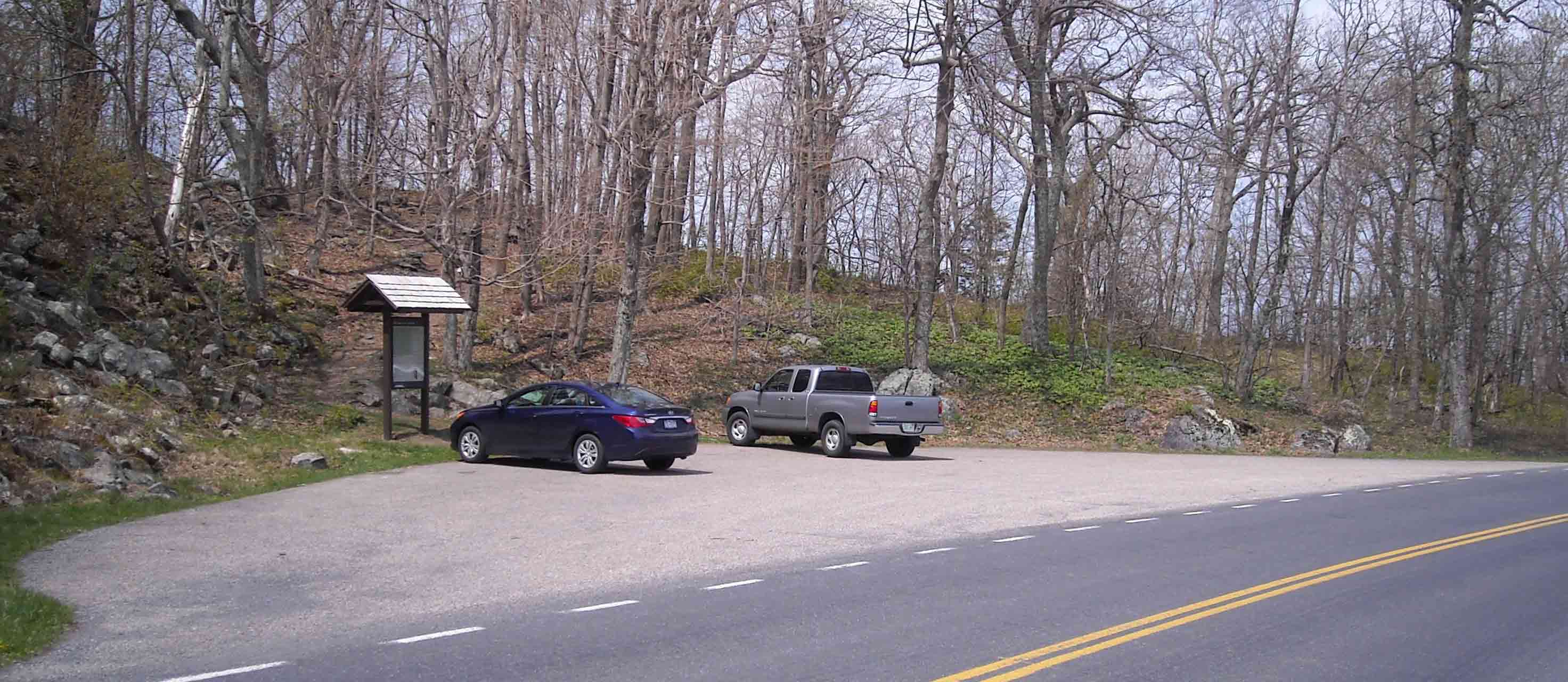 mm 7.9 - Parking area for trail to Little Stony Man Viewpoint, which is part of the AT. Sign in photo has out-dated map showing Passamaquoddy Trail as part of the AT - watch the blazes instead.  Courtesy MalteseCross@Comcast.net