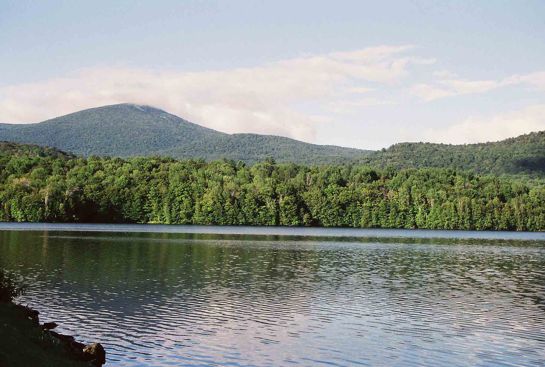 mm 19.7 - View from north side of Kent Pond. The AT runs along the south shore. The peak in background in Pico Peak.  Courtesy dlcul@conncoll.edu
